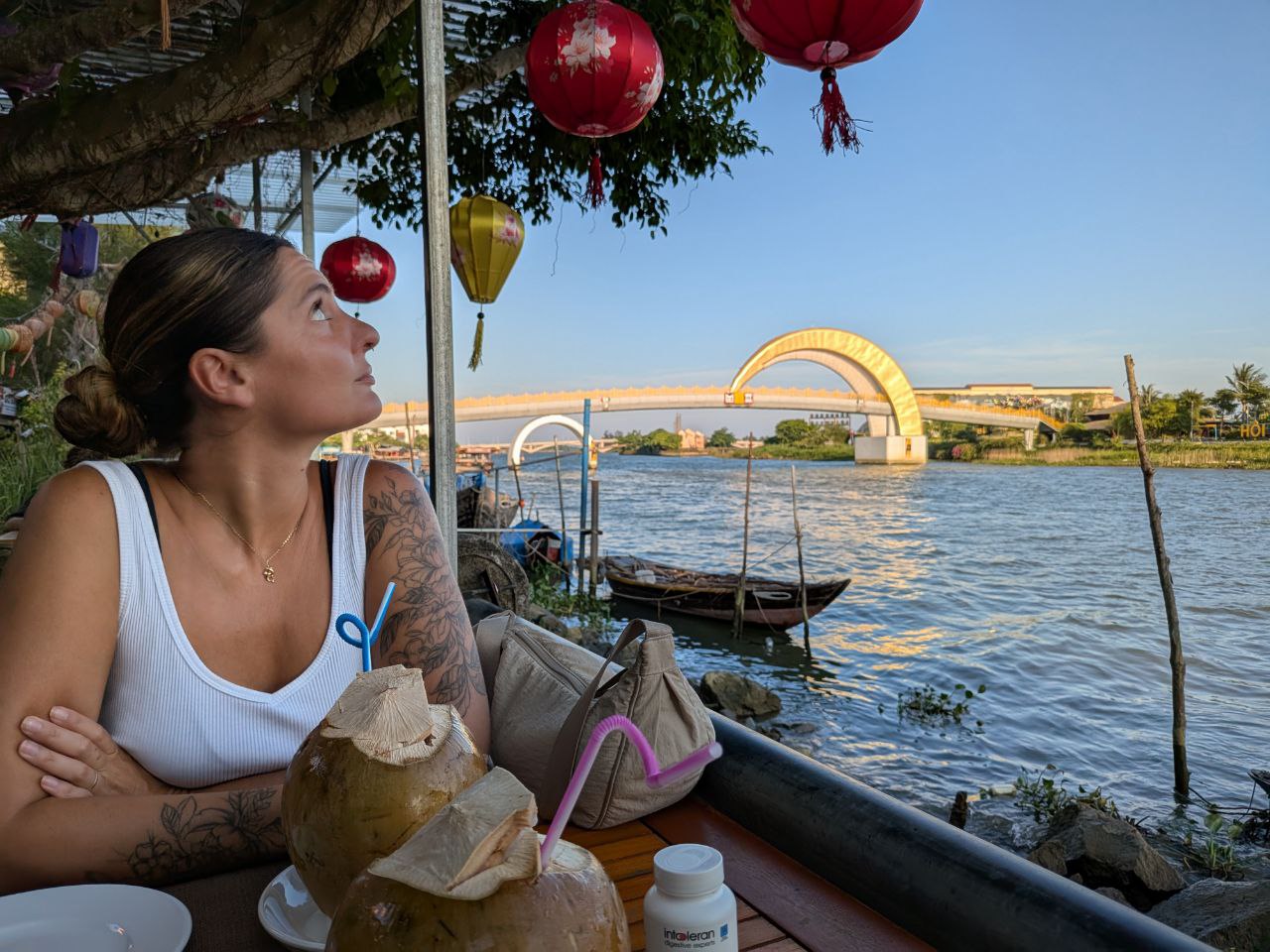 Fine line floral tattoo by Chloe Mez in Red Hill